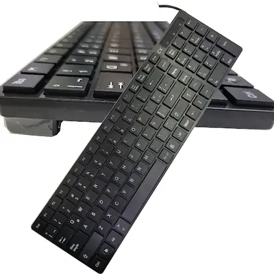 Vista lateral de Teclado Usb Cx En Espanol Negro Wk718 Teclas Planas Tipo Notebook